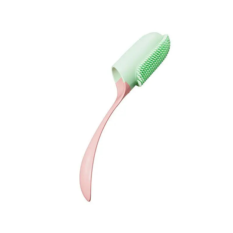 Brosse pour chien à long manche jaune. Pour un brossage facile et en profondeur.