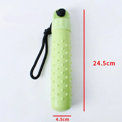 Jouet de lancer vert pour chien avec reliefs et corde noire
