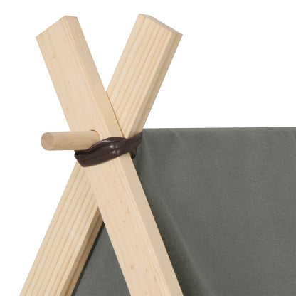 Détail des piquets en bois massif et des attaches du tipi pour chien
