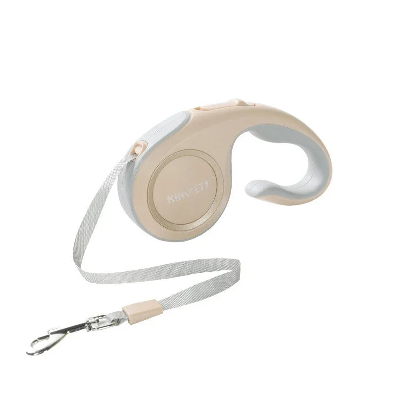 Laisse automatique beige élégante et légère, idéale pour les promenades de chien