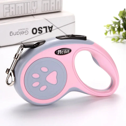laisse automatique rose pour chien petit à moyen – prise en main confortable