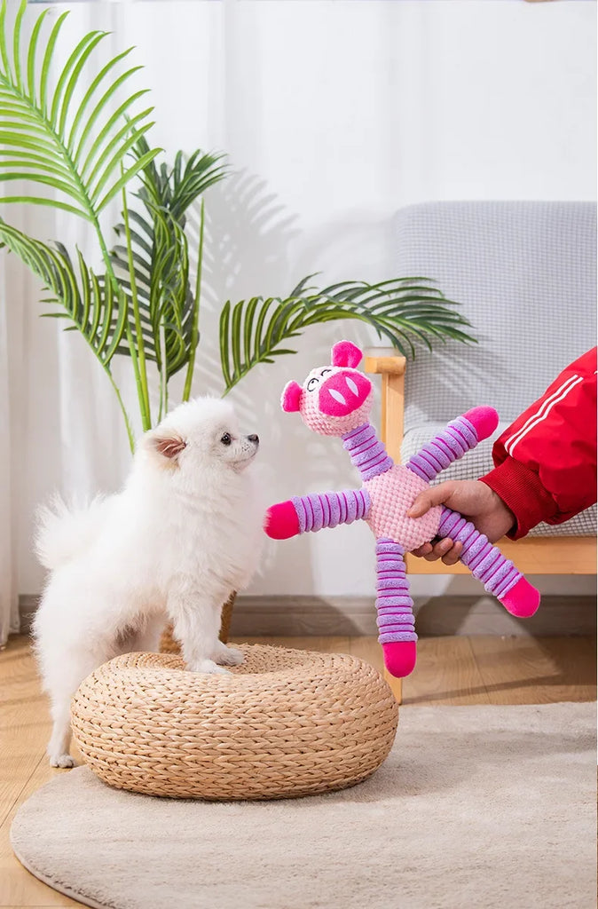 Gros plan sur la tête du jouet résistant chien ElephunGrip™, texture corduroy durable et yeux cousus.